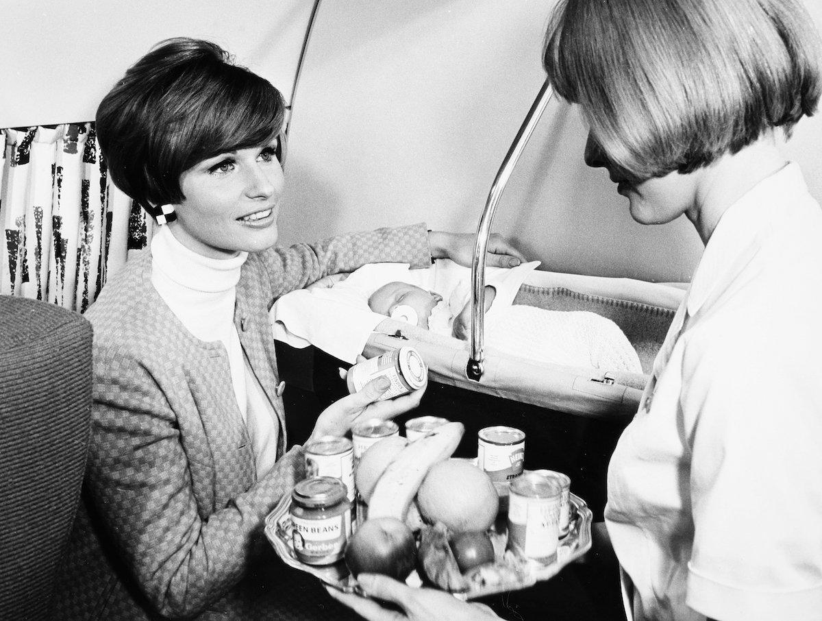 a-woman-traveling-with-her-baby-on-board-a-flight-in-1968-was-offered-baby-food-in-jars-provided-by-the-airline-that-year-scandinavian-airlines-started-a-service-for-children